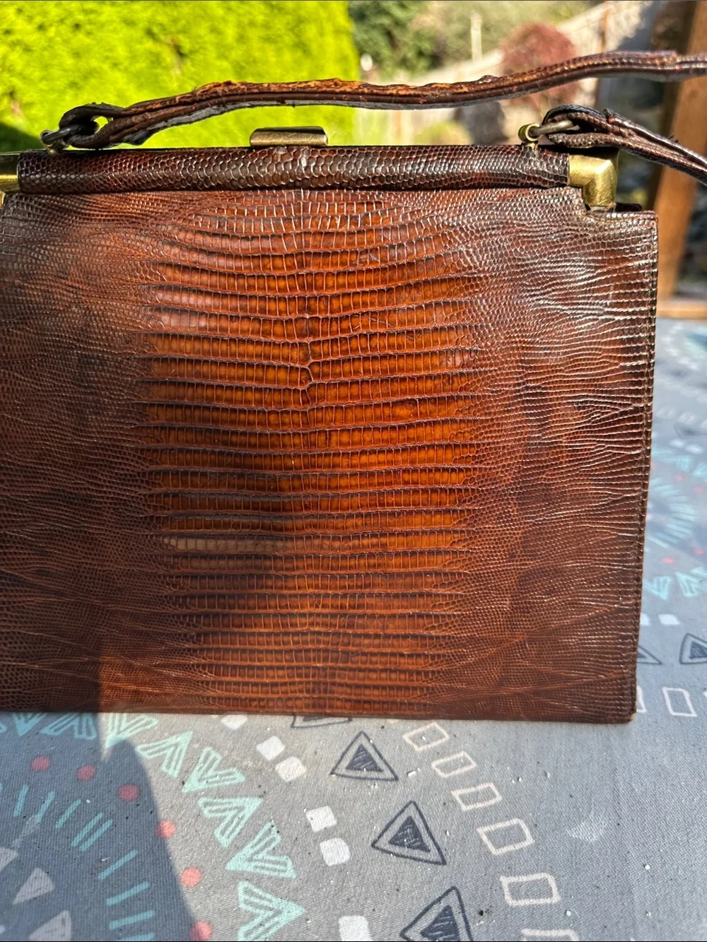 Women’s lizard skin mid century bag